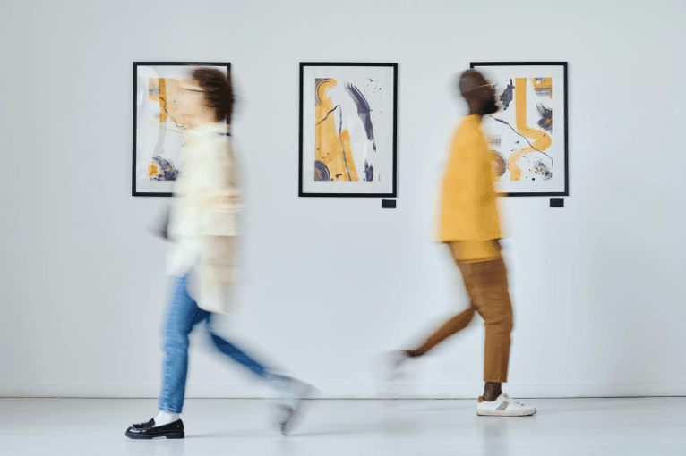 Emerging photographer showcasing their artwork at the Art Vision Awards.